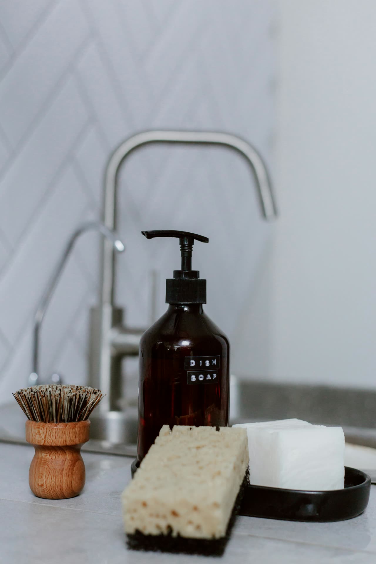 Close-up cleaning image with gloves, sponge and spray bottle for NKAY CLEANING